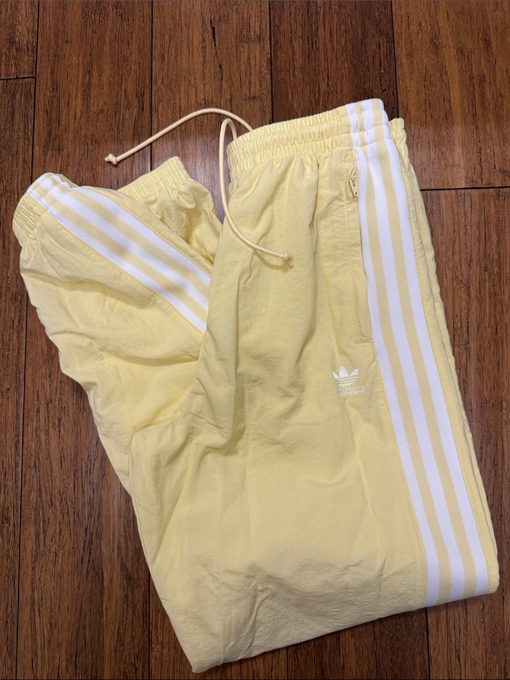 adidas Pale Yellow Track Pants with White Three Stripes